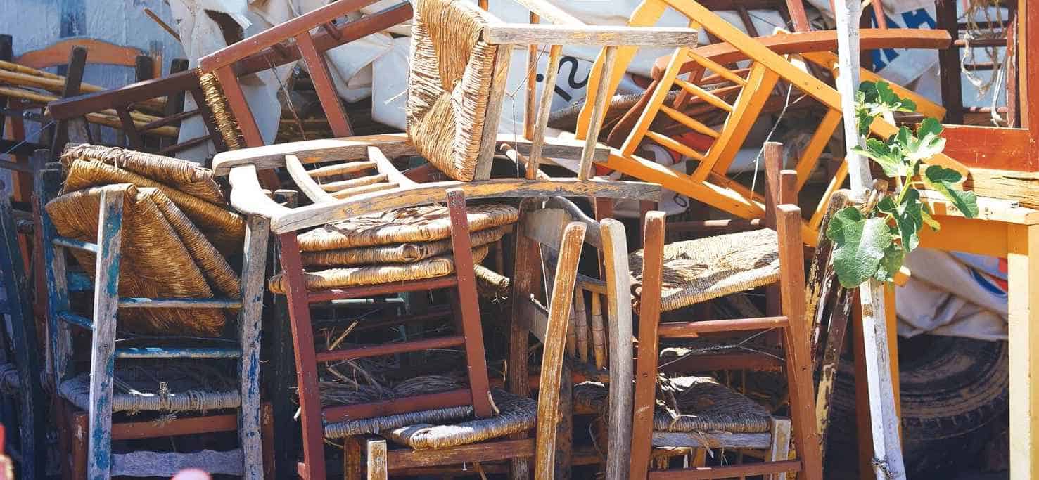 A Pile of Broken Dining Room Chairs